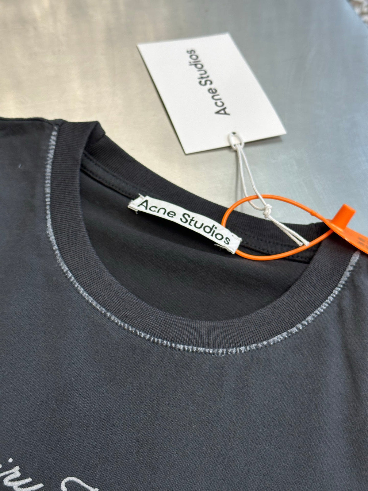 Acne Studios Retro Cursive Text Print Oversized Short‑Sleeve T‑Shirt